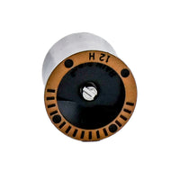 Close-up of Rain Bird 12 ft. half-circle MPR nozzle displaying color-coded top, nozzle body profile, and orifice positioning for coverage planning.