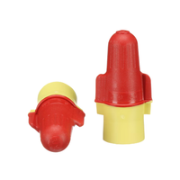 Close-up of 3M R/Y+ red and yellow twist-on connector showing steel spring, rounded wing shell, and insulated skirt.