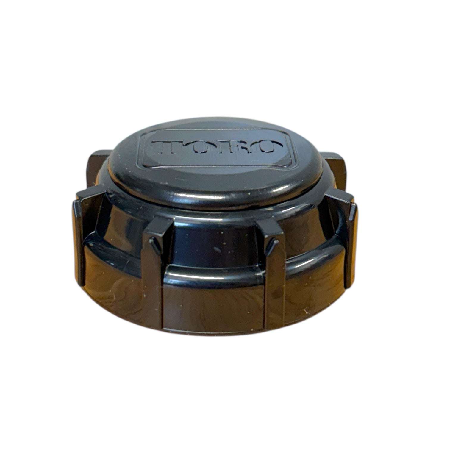 Side and angled view of Toro 570 cap (570-CAP) showing threaded insert and exterior profile for seating into 570 series pop-up bodies, on white background.