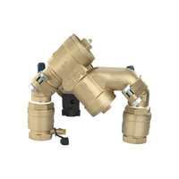 Side view of FEBCO F825HYA showing angle union connections and relief valve with flood sensor