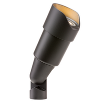 RS Up Light in flat black finish shown from an angle, illustrating the adjustable ProAim tilt, sturdy die-cast construction, and clear lens used for focused landscape uplighting.