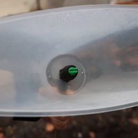 FlowZone Drift Guard installed on a sprayer, showing coverage pattern direction.