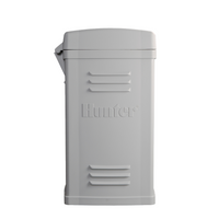 Hunter ACC2 decoder 75-station assembly mounted on a plastic pedestal, showing decoder module, pedestal base, wiring harness, and external antenna connector.