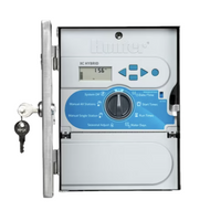 Front view of Hunter X-Core Hybrid stainless steel controller with mounted solar panel and weather-resistant enclosure.