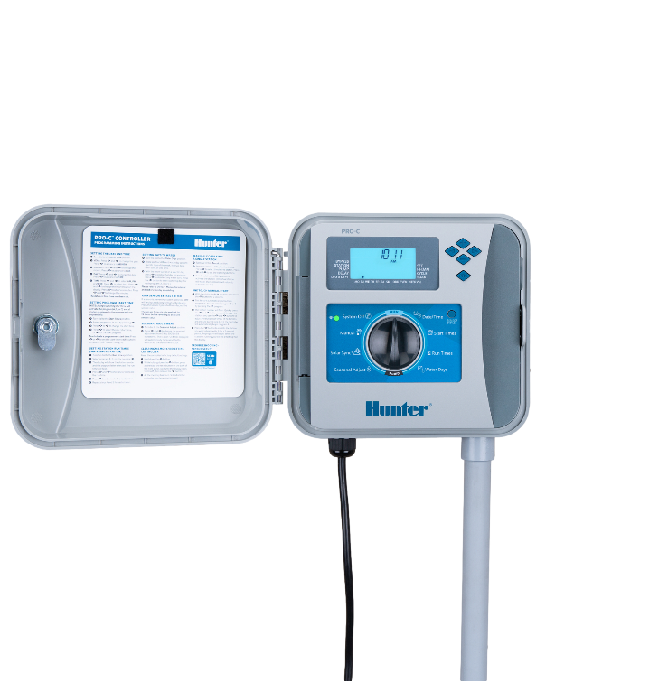Front view of Pro-C P2C-400 4-station outdoor modular irrigation controller showing backlit display, dial, and station terminals.
