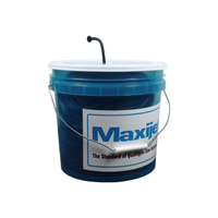 Coiled black Maxijet 1/4 in vinyl distribution tubing in a 500 ft bucket; roll of flexible tubing with visible label and packaging.