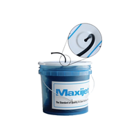 Close view of black Maxijet 1/4 in vinyl distribution tubing showing coiled tubing and bucket packaging for irrigation installs.