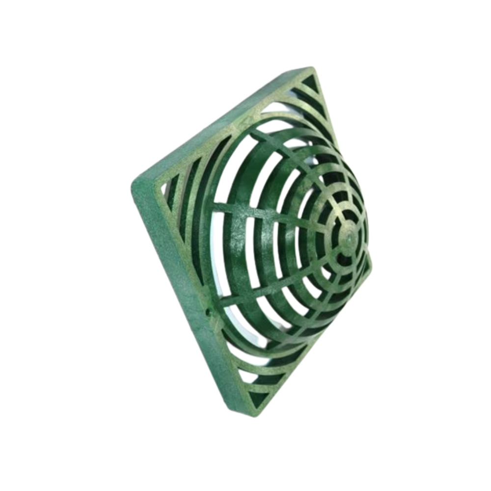 Green NDS 991 9-inch square atrium drain grate made from UV-stabilized polyolefin, domed profile showing square perimeter and rectangular openings, angled view