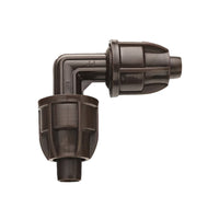 Angled view of Netafim TechLock 17mm elbow in dark brown, highlighting barbed insert and compact, low-profile design.