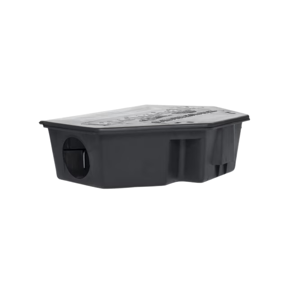 Open interior view of PROTECTA LP bait station (LP2625) showing bait securing rods, one-piece liner, and access area for the 2-prong key.