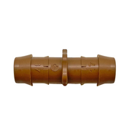 Close-up of a single Pro-Trade 17mm drip coupling from the 25-piece bag, showing multi-barb profile and coupling shape.