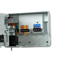 Interior view of Rain Bird ESP-2WIRE cabinet with wiring access, terminal strip for decoders and field wiring, and diagnostic LED indicators.