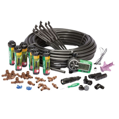Rain Bird 32ETI kit components: six 32SA pop-up rotors, 1ZEHTMR timer, 125' tubing, fittings and installation tools.