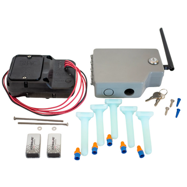 Front view of Thrive EVO TEVO-04 transmitter and receiver assembly with wiring terminals visible and compact weather-resistant enclosure.