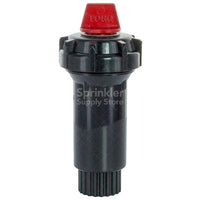 Toro 570Z-2P pop-up spray head installed in planting bed demonstrating low 2-inch profile and small cap for tight landscaping areas.