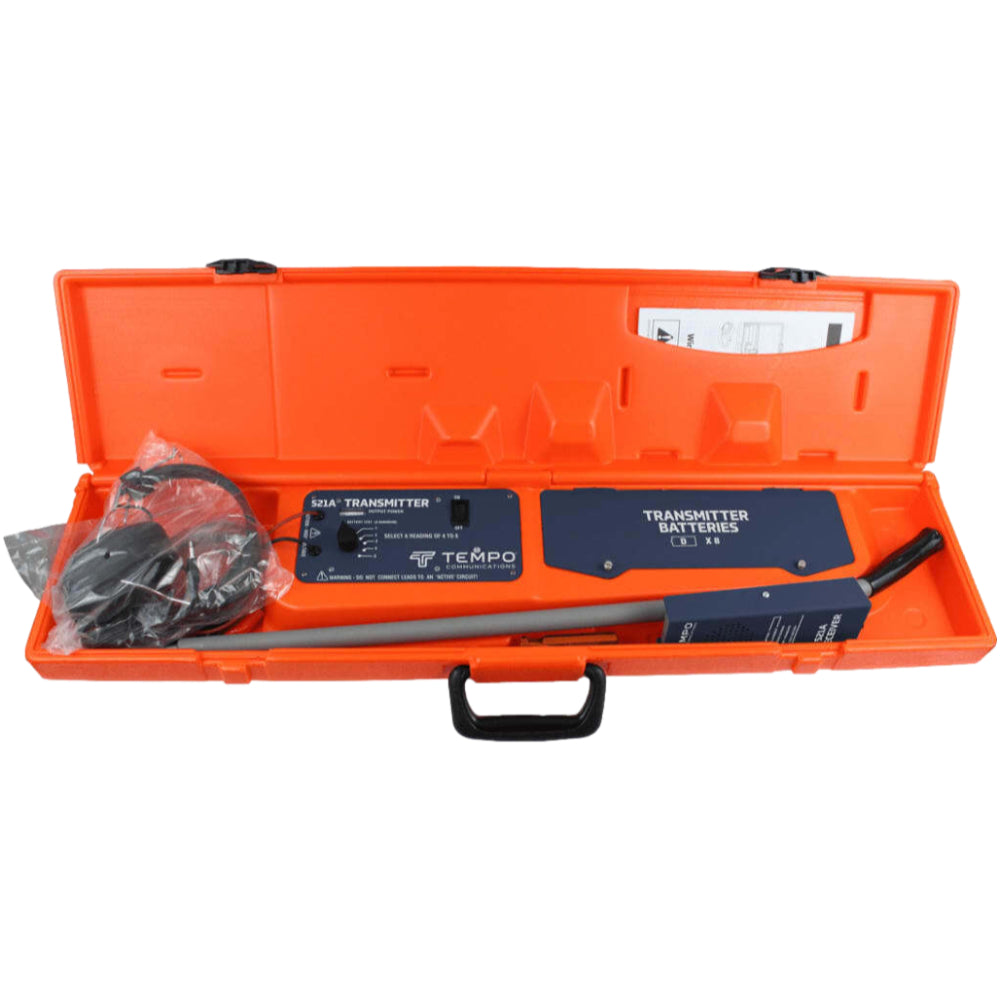 Close-up of Tempo 521A receiver wand and headphones beside the transmitter unit and slim-line carry case, angled view