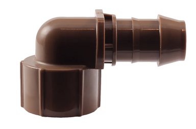 Close-up of Rain Bird XFF-FA-050 low-profile 17mm barbed elbow female adapter in earth-tone UV-resistant plastic, showing the 1/2-inch FPT inlet and barb detail.