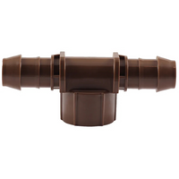 Close-up of the Low Profile XF Tee Female Adapter focusing on the barb detail and threaded inlet; designed for quick, low-force insertion into 17mm dripline.