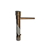 Side view of Toro 075-SLK quick coupler key installed in housing showing single-lug engagement and cover surface