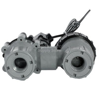 Angled view of Rain Bird 075ASVF 3/4-inch anti-siphon valve installed above ground, highlighting inlet/outlet threads, vacuum breaker cap, and solenoid connection points.