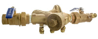 Close-up of union ball valve shutoff and male pipe thread connection on Wilkins 975XLU 1-inch backflow preventer, bronze finish.
