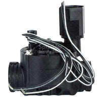 Close-up of Rain Bird HV 100-HV-SS valve showing solenoid top, electrical connector, and bonnet fasteners for servicing.