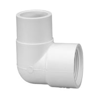 1-inch PVC 90° street elbow showing spigot end and female threaded FIPT connection, smooth white finish and markings.