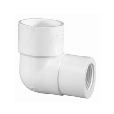 White Schedule 40 PVC 90-degree reducing elbow, 1-1/4" slip to 1" female iron pipe thread, front angle on white background.