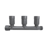 Lasco 1201-310 triple female PVC manifold with three valve ports, ring nut and 1" female thread on white background.
