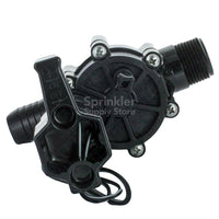 Rain Bird 100DVMB valve installed on poly pipe with barb connection; stainless steel screws and captive spring visible for durable outdoor use.