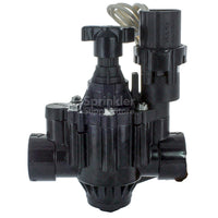 Rain Bird 100PGA 1-inch plastic globe valve shown at an angle, displaying solenoid mounting, flow-control handle, and threaded 1 in NPT connections for irrigation systems.