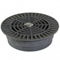 NDS 10-inch round drainage grate (model 1060) in gray, angled view showing slotted top surface and outer mounting lip.
