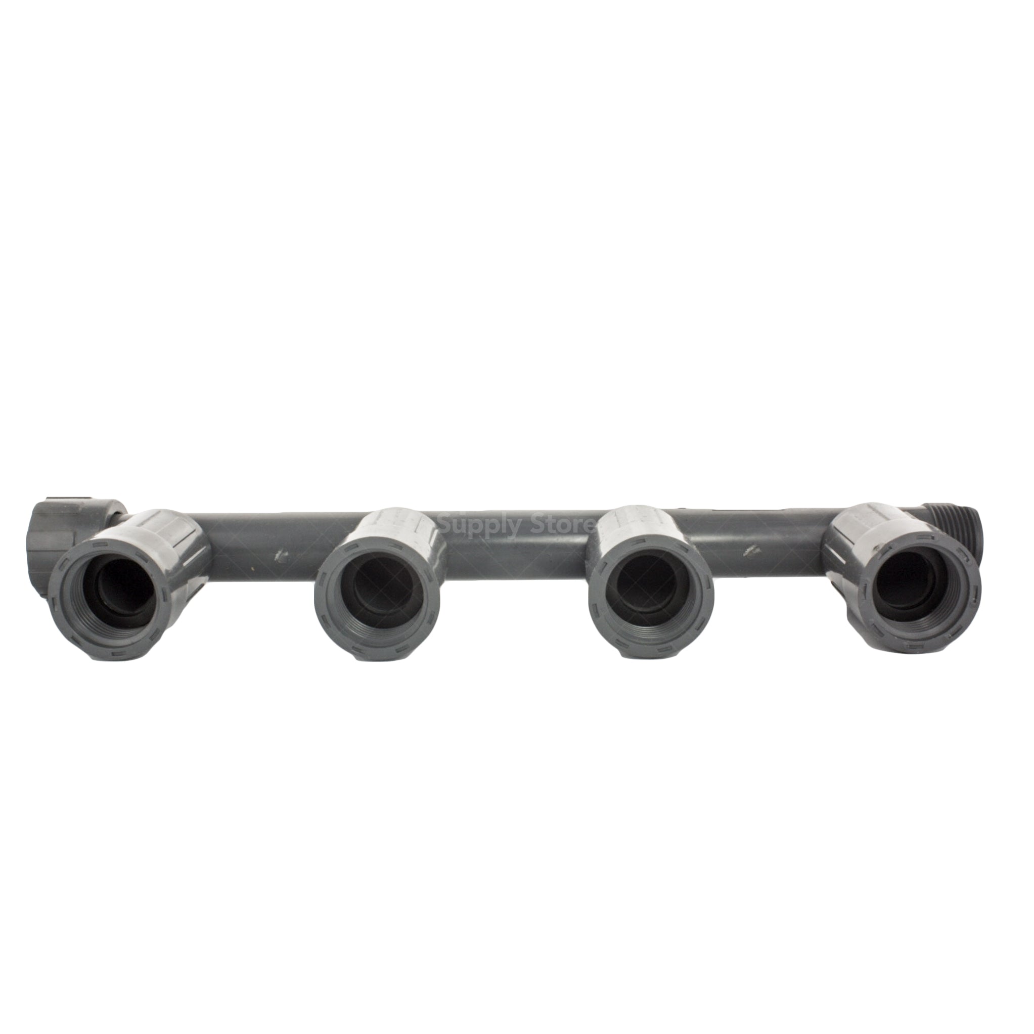 Angled photograph of 1" PVC quad manifold female (1201-410) highlighting the threaded nut and FVCONN-style outlet connections for irrigation assemblies.