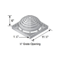 Close-up of NDS 1290 black atrium grate showing slotted openings, domed profile, and UV-resistant HDPE material texture.