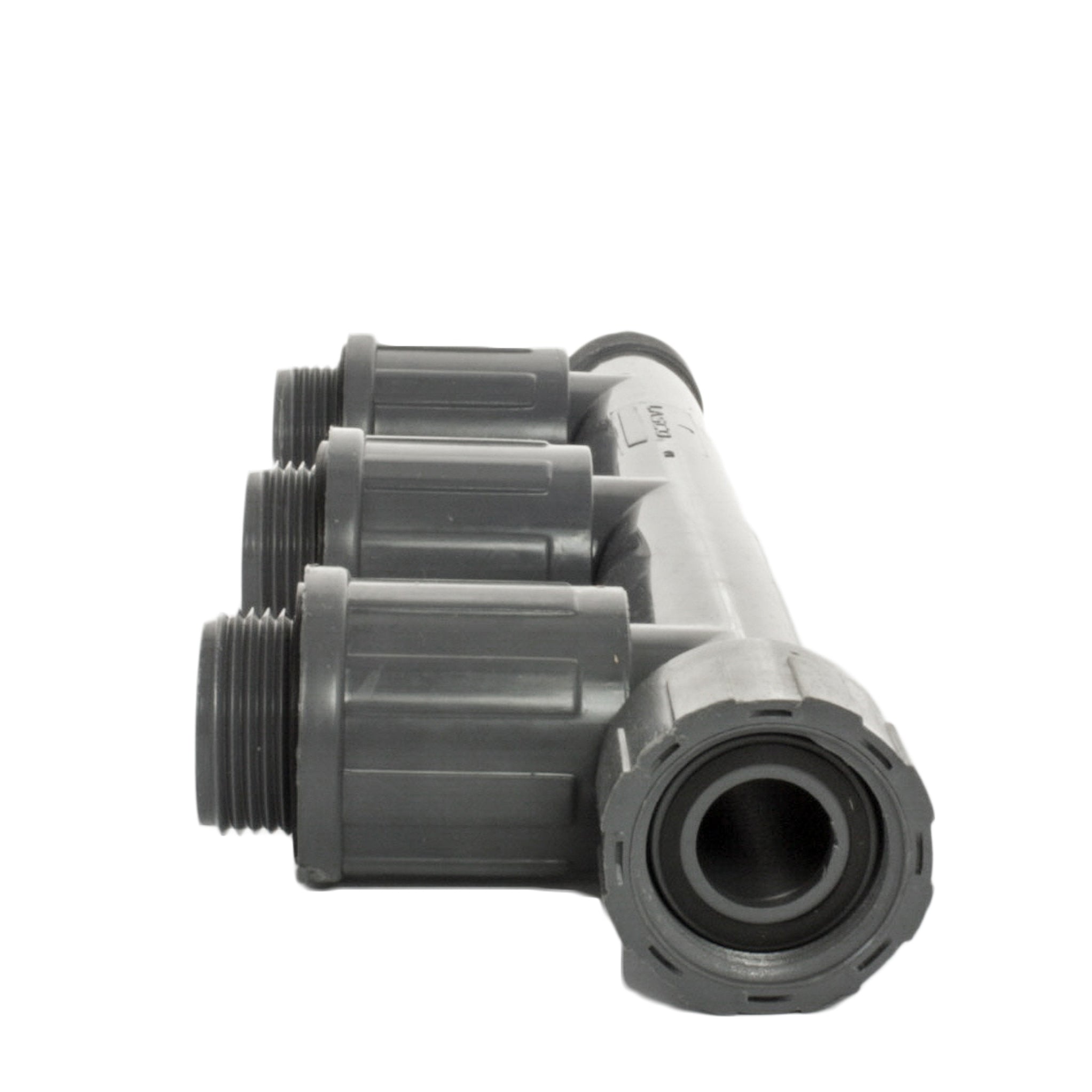 Group view of the Lasco 1301-310 Triple Tee showing three outlet ports and the compact manifold layout used to assemble irrigation valve groups.