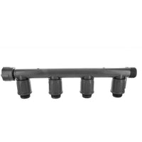 Front view of model 1301-410 1-inch PVC quad tee irrigation manifold showing four outlet ports and threaded connection details.