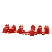 Close-up photograph of the Hunter 130900SP red nozzle rack installed in a PGP-ADJ rotor, showing nozzle tips and rack seating detail.