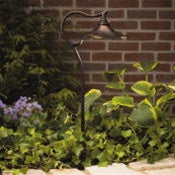 Kichler Cotswold 15422AGZ 12V path light in Aged Bronze, angled view highlighting shade detail and integrated stake.