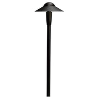 Textured black Kichler 6-inch dome LED path light on white background, showing slim dome shade, cast-aluminum housing and 22-inch stake for landscape placement.