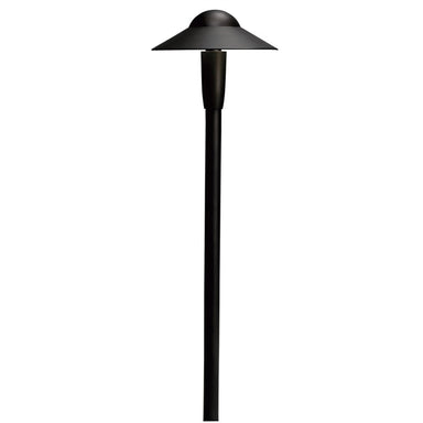 Textured black Kichler 6-inch dome LED path light on white background, showing slim dome shade, cast-aluminum housing and 22-inch stake for landscape placement.