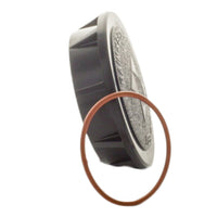 Rain Bird 1800XC Xeri-Cap installed in a 1800 Series spray body with top exposed, illustrating placement in a lawn setting.