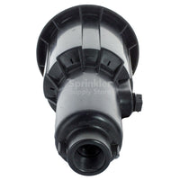 Installed Rain Bird 2045A Maxi-Paw sprinkler at ground level showing 3" pop-up height and 5" exposed surface diameter.