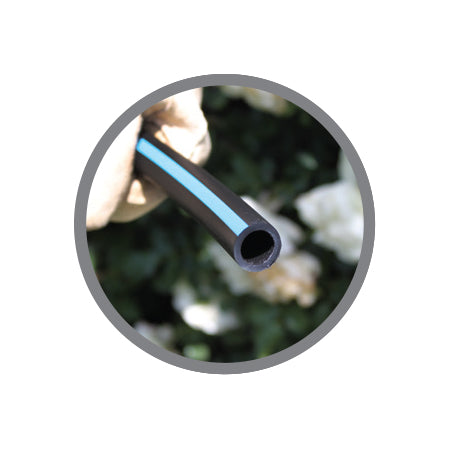 Close-up of Super Blue Flex tubing showing the blue stripe, flexible polyethylene construction, and coil edge for installer reference.