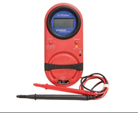 Handheld King 42010 IrriMeter auto-ranging voltage meter showing front display and probe ports for irrigation testing.