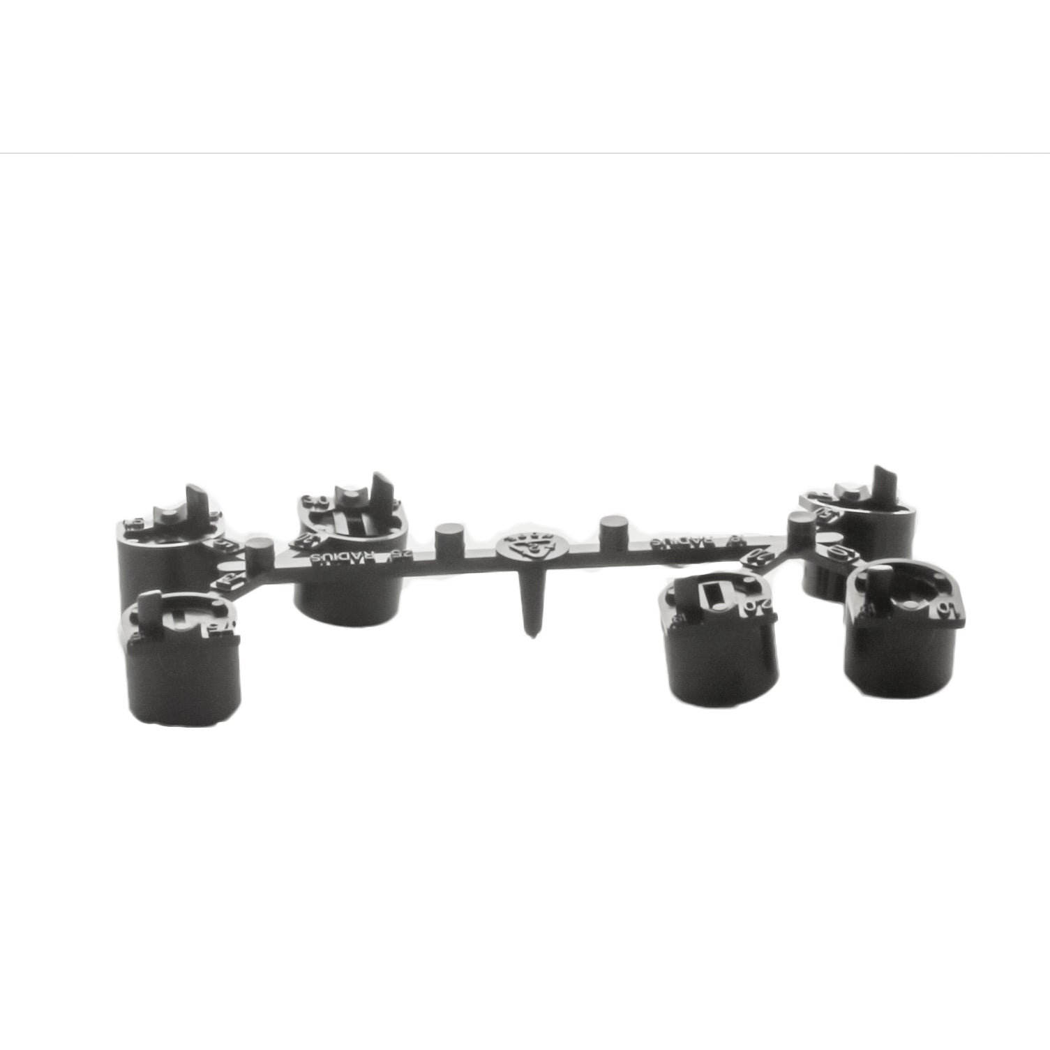 Top-down view of Hunter 466100 nozzle rack in black highlighting nozzle arrangement and headed slot with set screw for secure fit.