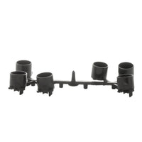 Side angle of Hunter 466100 PGP Ultra black nozzle rack mounted in rotor head showing nozzle outlets and alignment details.