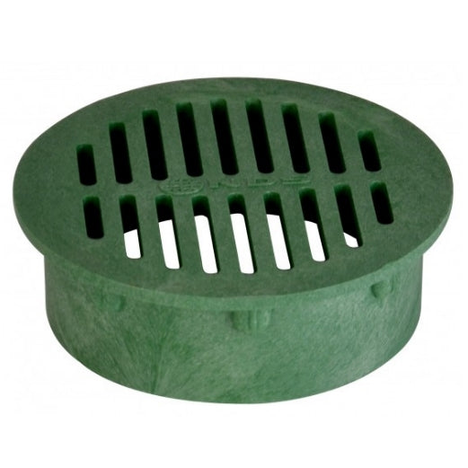 Top view of NDS Model 50 6" green round drainage grate showing slotted open surface and outer rim for Spee-D basin installation, visible texture.