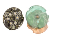 Detailed shot of FX 6LEDULKIT showing color filters (amber, green, blue), the reflector, and the LED board ready for replacement.