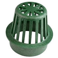 Close angled view of NDS 75 green 4-inch atrium drain grate showing the raised dome pattern and circular collar for a 4-inch pipe connection.