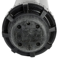 Close-up of Rain Bird 8005 rotor head and brass-reinforced turret, highlighting the top-access adjustment and Rain Curtain nozzle port.